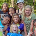 Smiles from camping friends Smiles from a group of campers and their counselors